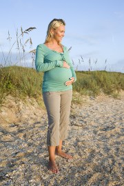 Pregnant woman at beach.